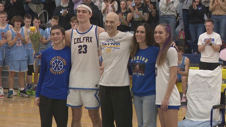 Coach battling cancer makes return