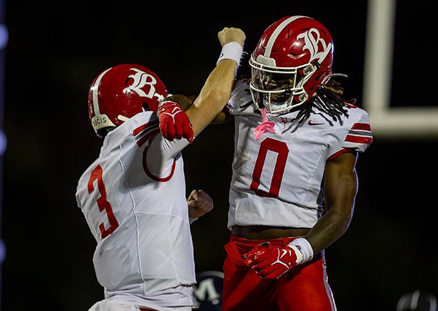 Baylor quarterback Briggs Cherry (3) and the star of the night David Gabriel-Georges (3) celebrate a first-half touchdown in Friday night's rivalry win over McCallie. (PHOTO: Andy Mitchell)