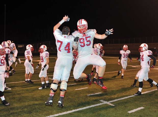 Arrowhead players celebrate after winning their 2012 state title.