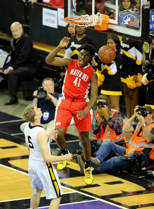 Johnson throws down a dunk in the state title game.