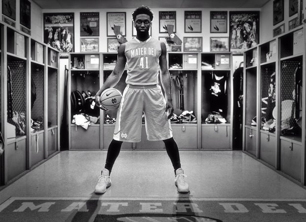 Johnson poses in the team's expansive trophy room.