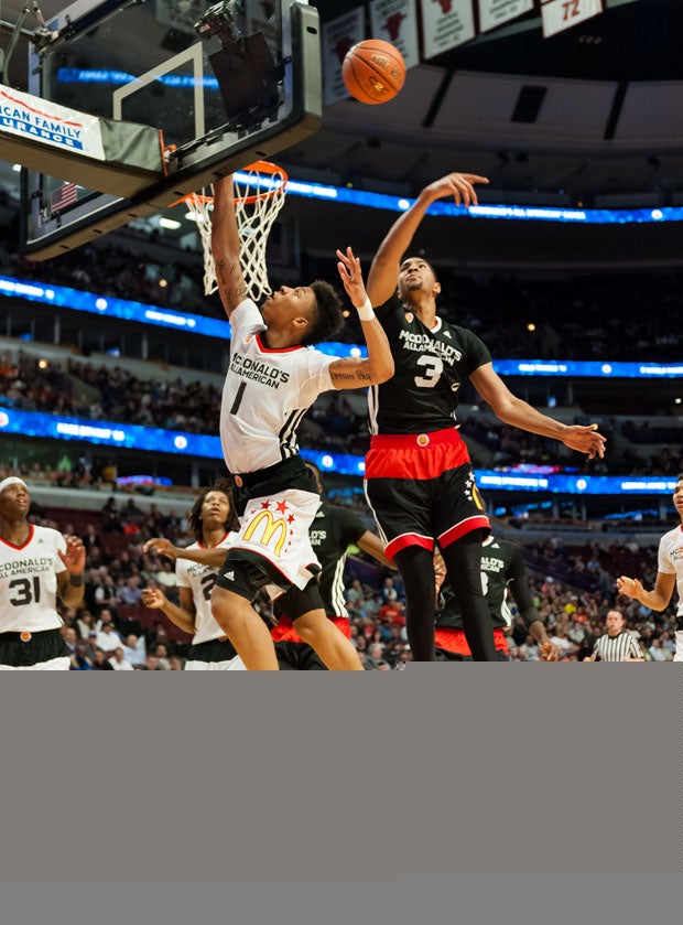 The West's Malachi Richardson (1) tangles with Dedrick Lawson (3).