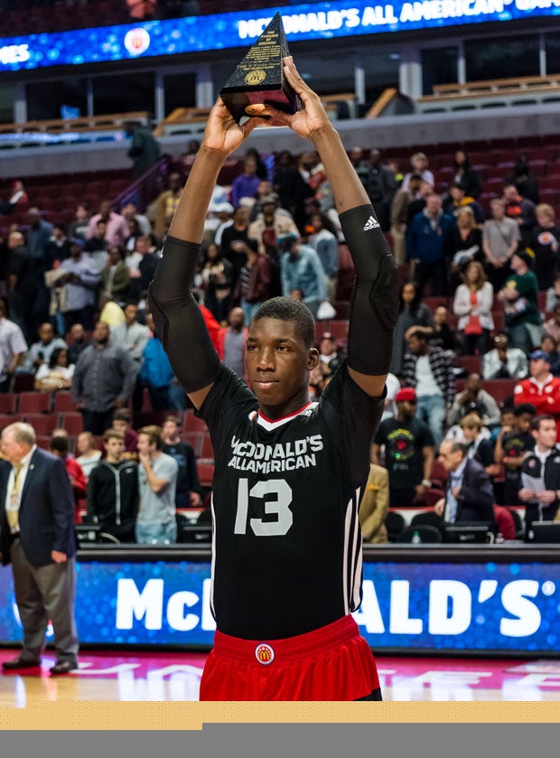 Cheick Diallo holds up the MVP trophy.