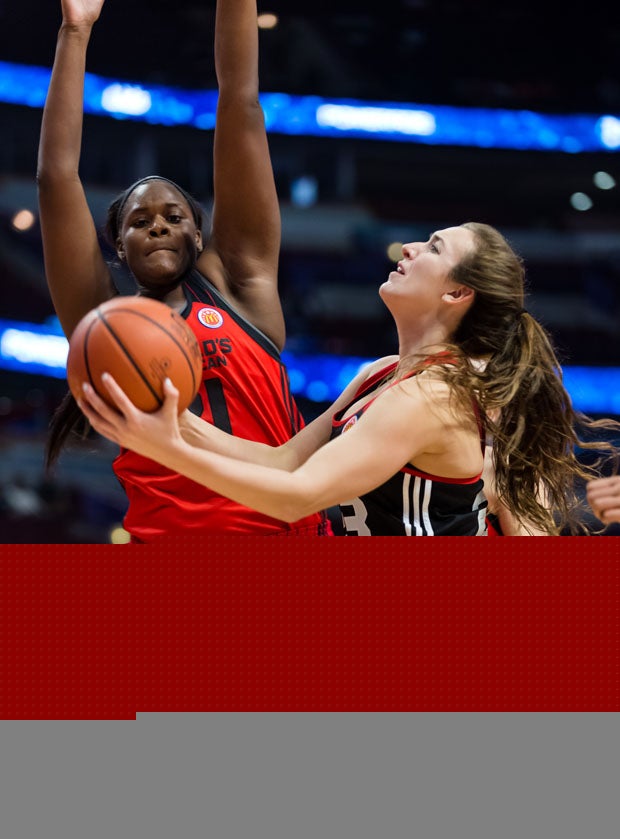 Marina Mabrey goes for a shot while Kalani Brown defends.