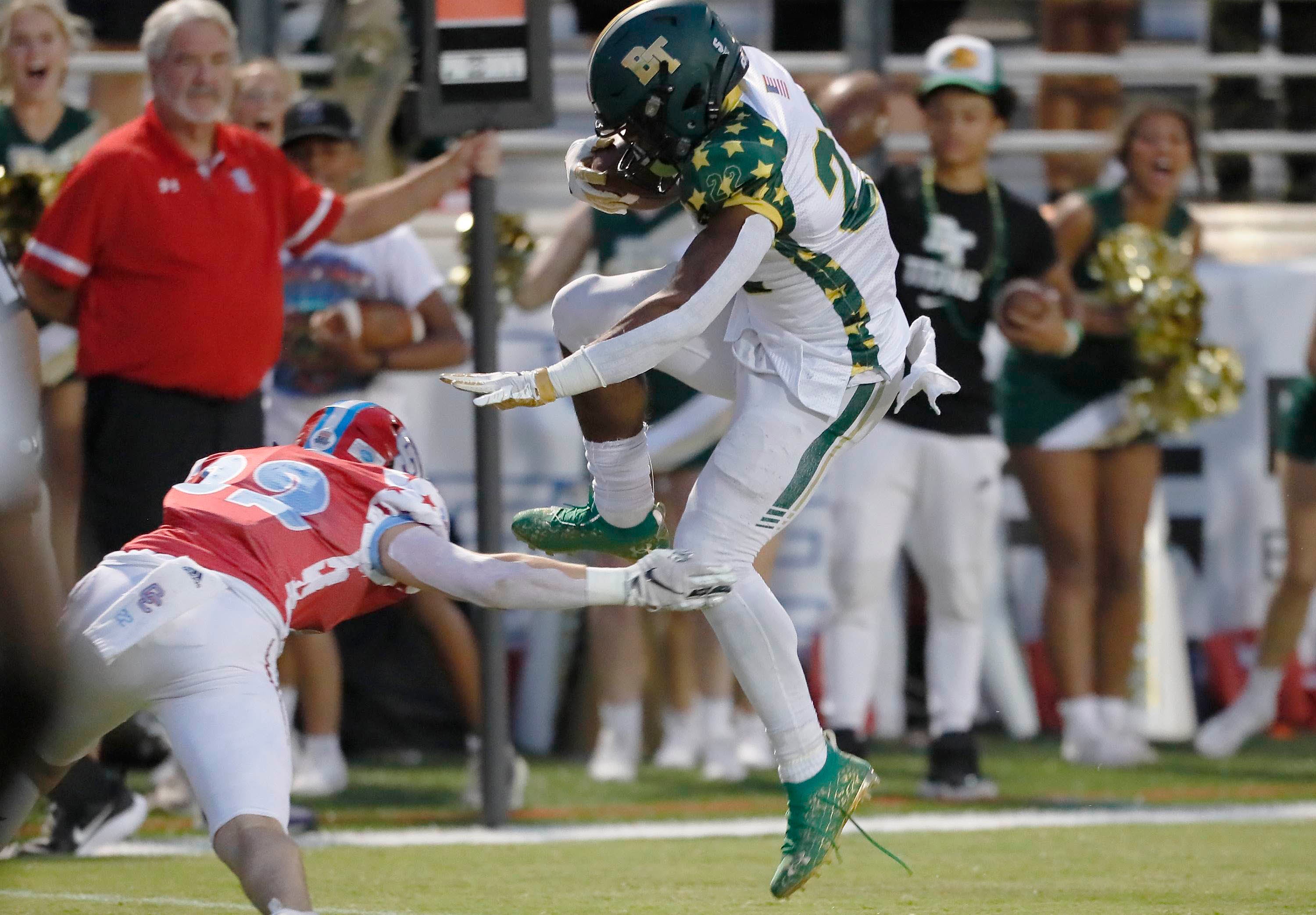 Running back Justice Haynes last season with Blessed Trinity.