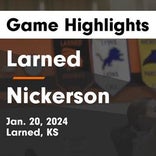 Larned piles up the points against Russell