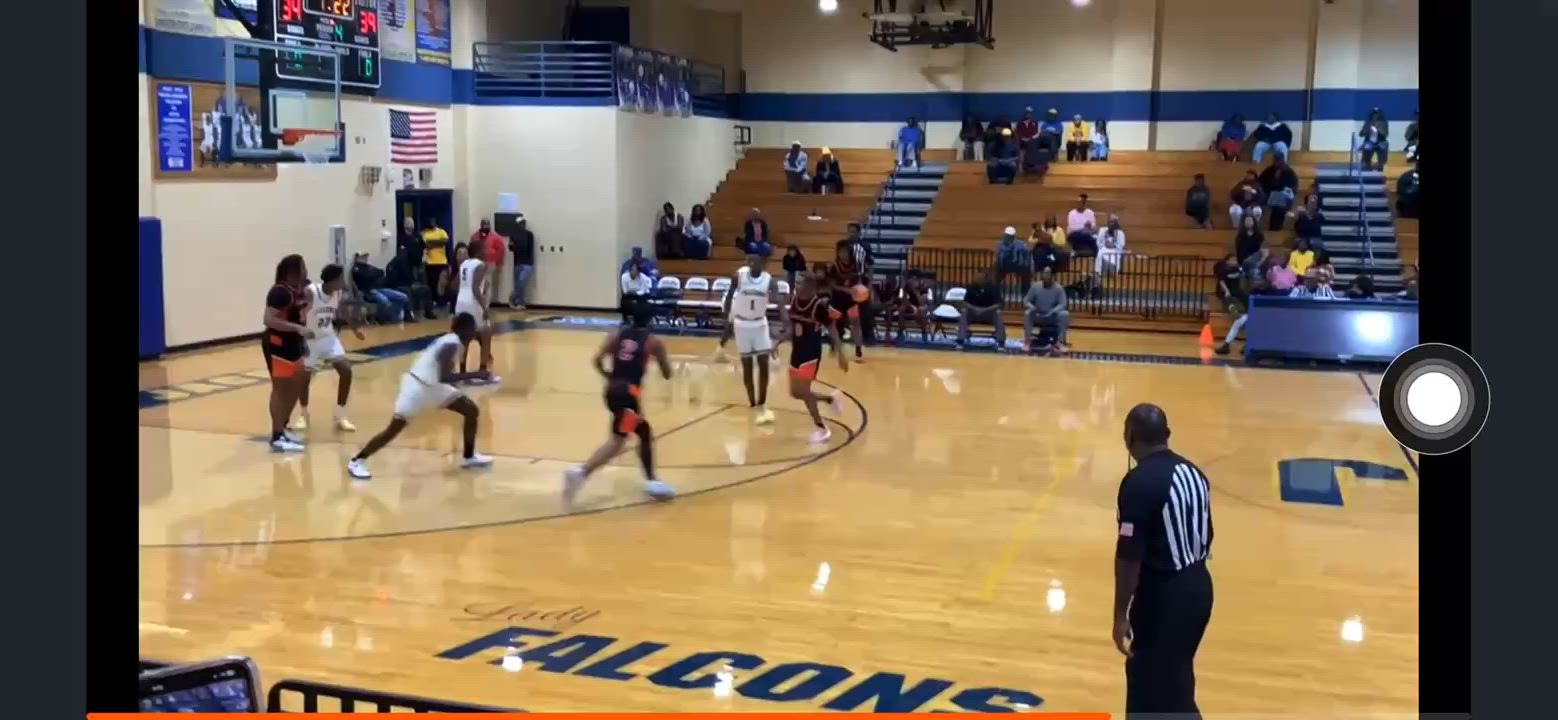 Basketball Recap: Aaron Harrell Leads a Balanced Attack to Beat Scott Central