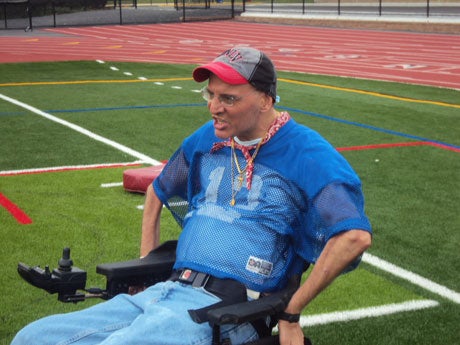 Football coaches and community members often pitch in to help Zisa pay his bills.