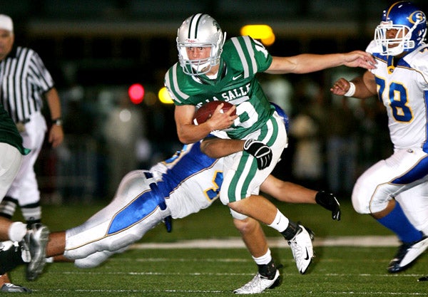 Scott Herting (16) helped lead No. 21 De La Salle to a season-opening 14-7 win.