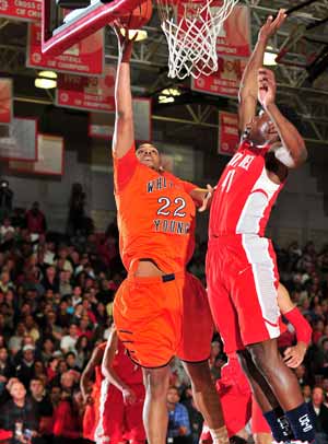 Jahlil Okafor goes to the hoop while Mater Dei'sStanley Johnson crashes in for a block.
