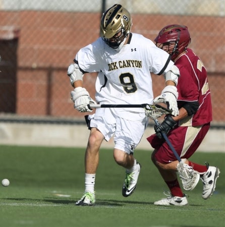 Rock Canyon junior Wilkins Dismuke has stayed focused on elevating the play of his teammates this season. He is the second-leading scorer in the state and already has a scholarship to Johns Hopkins.
