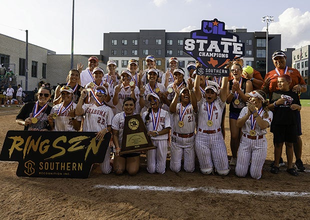 Coahoma celebrates its 6-1 win over Lexington in the Texas Conference 3A Division 2 state championship game. The Bulldogs, who are 103-4 over the past three seasons, became the first softball program to three-peat in the Lone Star State. (PHOTO: Jason Harrison)