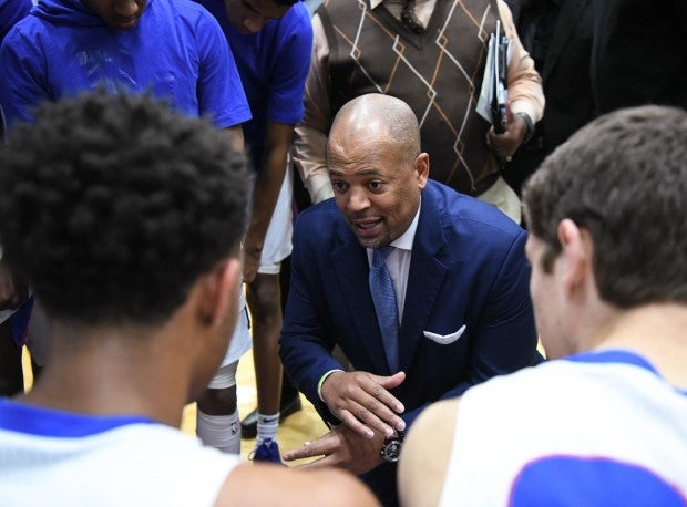 Mike Jones coaches up his DeMatha squad during a timeout.