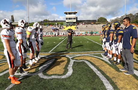 West and Punahou players prepare to kick off the 2012 football season Friday.
