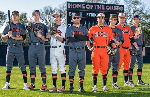 Head coach Benji Medure (center) is surrounded by a wealth of talented players this season.