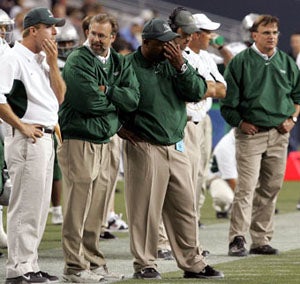 The De La Salle coaching staff was shell-shocked
during the first half of its loss to Bellevue in 2004.