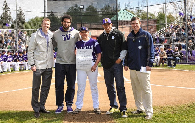 Nathan McCarty (middle) celebrates the day his wish for a field of dreams was complete. 