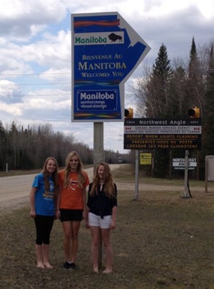 The three Warroad girls entering Canada.