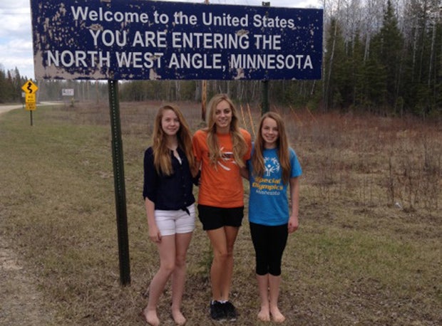 Meaghan Carlson, Madison Goulet and Kelby Goulet (left to right) leave America and re-enter the country every time they go from home to school. The only way to get home from track practice without driving into Canada is taking a boat.