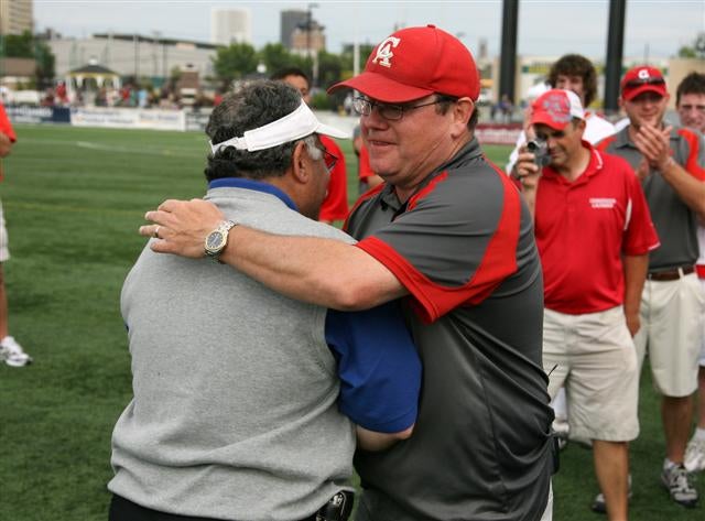 Canandaigua head coach Ed Mulheron (right) following his team's state championship victory over Niskayuna.