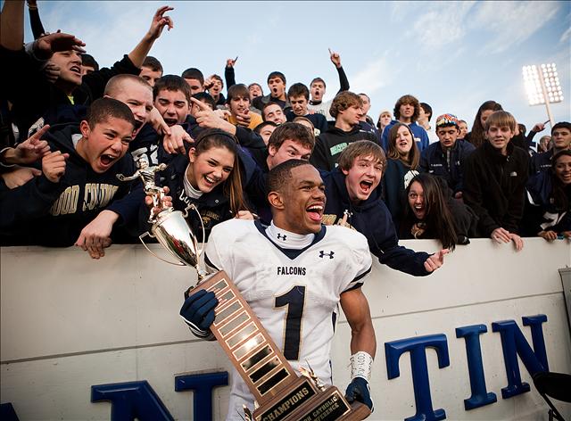 Our Lady of Good Counsel's Louis Young celebrates with fans after upsetting DeMatha in the WCAC final.