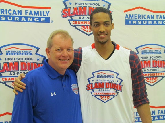 American Family Insurance agent Dan Johnson and future North Carolina Tar Heel J.P. Tokoto.