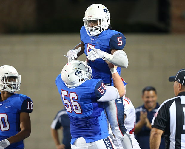 Brock Sturges celebrates one of his four touchdowns for Allen.