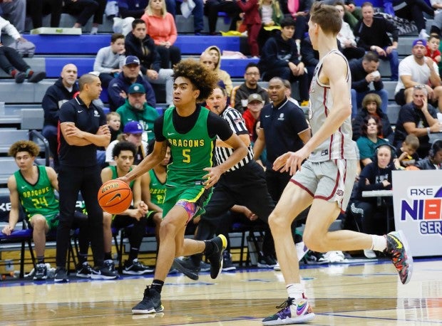 Five-star junior Vyctorious Miller (5) and AZ Compass Prep take over the top spot in the rankings. (Photo: Terry Cullop)