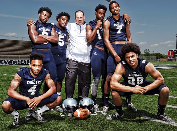 Clay-Chalkville head coach Jerry Hood (center) is surrounded by players (kneeling left to right) Desmond Williams and Terry Brown; (back row left to right) Ty Pigrome, A.J. Walker, T.J. Simmons and Nico Collins.