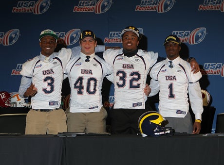 Devin Butler (3), Ben Gedeon (40), Khalid Hill (32) and Jourdan Lewis (1) pose at the 2013 USA Football Signing Day Breakfast at The Renaissance Hotel Austin Wednesday. 