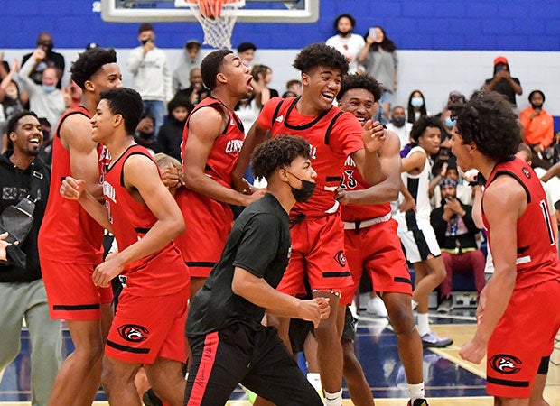 Centennial players celebrate their victory over host Sierra Canyon on Friday night in the Southern Section Open Division title game.
