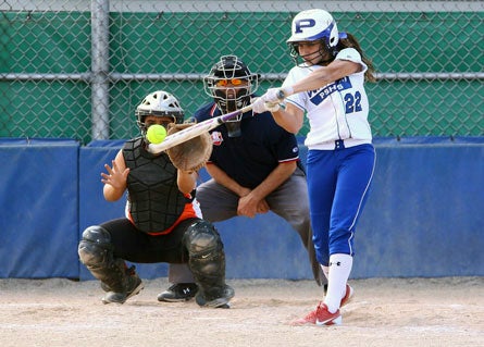 Though she's piled up 23 home runs and batted over .500 during her storied career, Erin Gabriel is best known as Poland's ace pitcher.