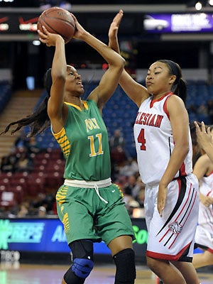McDonald's All Americans Lajahna Drummer (11)
and Mariya Moore (4).