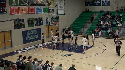 Basketball Recap: Titus Schrecengost Leads a Balanced Attack to 