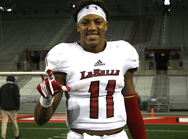 Louisville recruit Treseason Smith carried the ball 17 times for 124 yards and two touchdowns in a 14-7 win over Massillon Perry in the D-II state final. Also had two tackles and an interception.