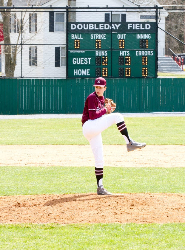 A Scarsdale High pitcher gets set to deliver a pitch.