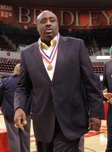 Simeon head coach Robert Smith proudly wears his state championship medal Saturday night.