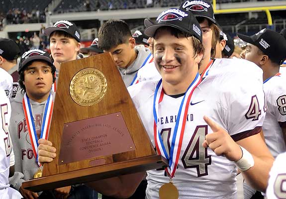 Pearland junior Cole Stoudt celebrates the team's improbable state title, which featured wins over state powers Katy and Trinity.