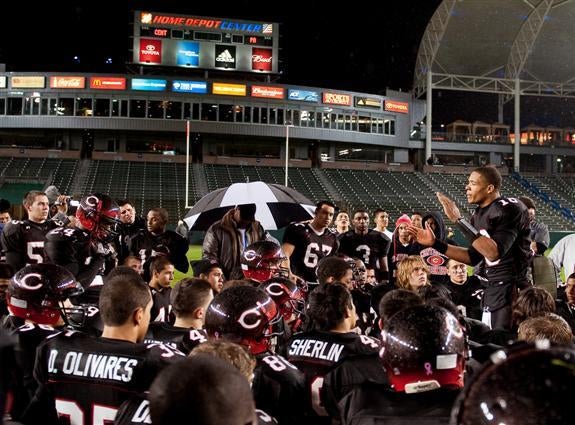Michael Eubank addresses Centennial after a 15-13 loss to Palo Alto, the only blemish on the Huskies' record-setting season.