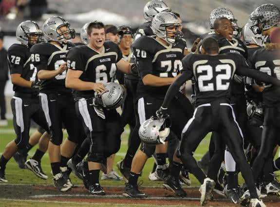 Hamilton rushes onto the field after closing out another 5A-I state title.