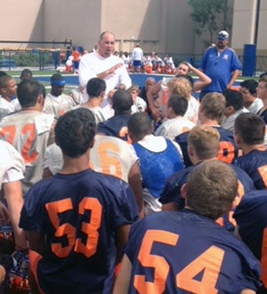 Gorman coach Tony Sanchez addresses his
football team in 2013.