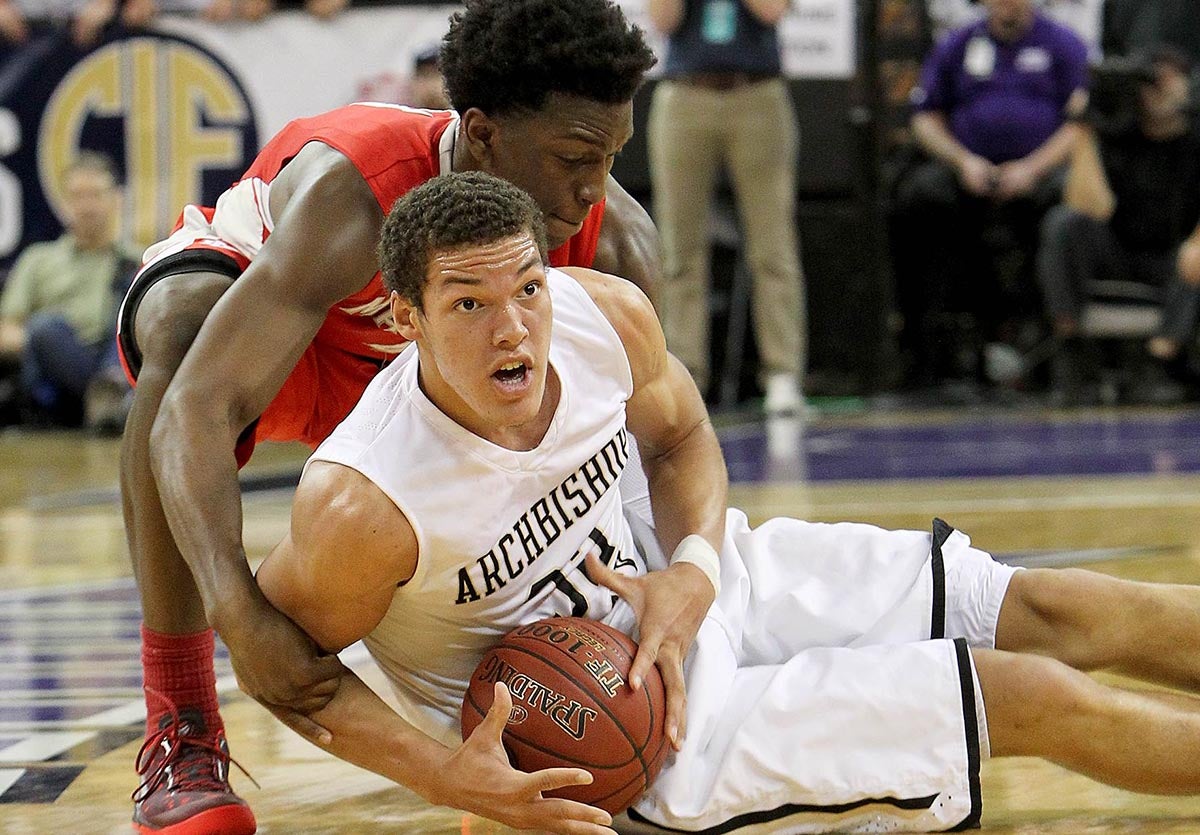 Aaron Gordon of Archbishop Mitty hangs on to the ball against Stanley Johnson and Mater Dei during the CIF State Championship. A few months later Gordon took on future Denver Nuggets teammate Nikola Jokic at the 2013 FIBA U19 World Championship. (Photo: Dennis Lee)