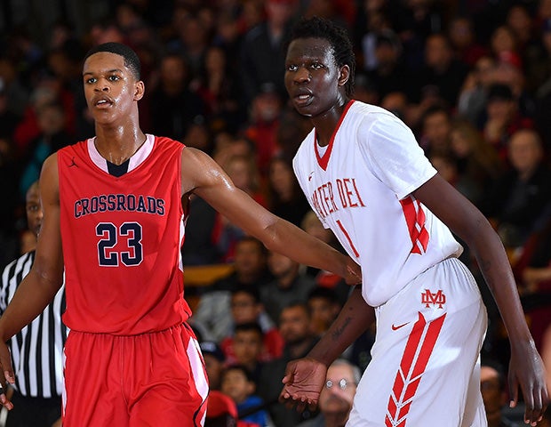 Crossroads' Shareef O'Neil (left) squares off with Mater Dei's Bol Bol on Friday night.