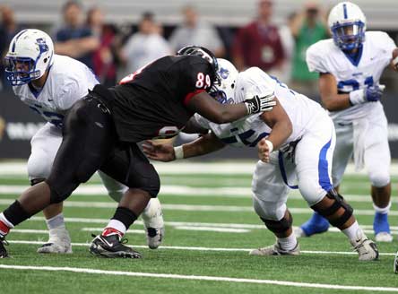 Bingham, in white, wasn't accustomed to using cut blocks when it voyaged to Texas to play Trinity in 2009.