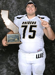 Spencer Stark celebrates 2012 state
title for Central Catholic.
