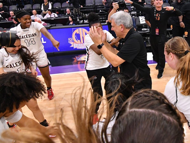 Salesian coach Stephen Pezzola with his version of 'The Griddy,' following his team's Division I victory over Windward. 