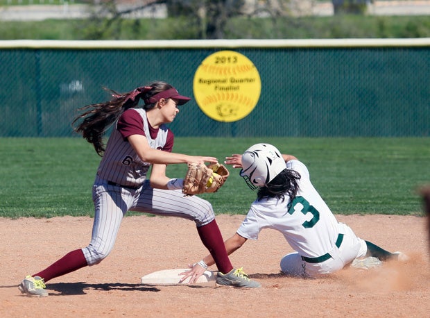 Incarnate Word's Sofia Herrera slides in safe for the state champion Shamrocks.