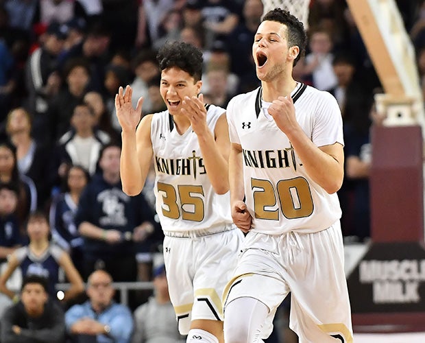 Fletcher Tynen (left) and Jordan Schakel of Bishop Montgomery celebrate during their victory over Sierra Canyon on Friday night.