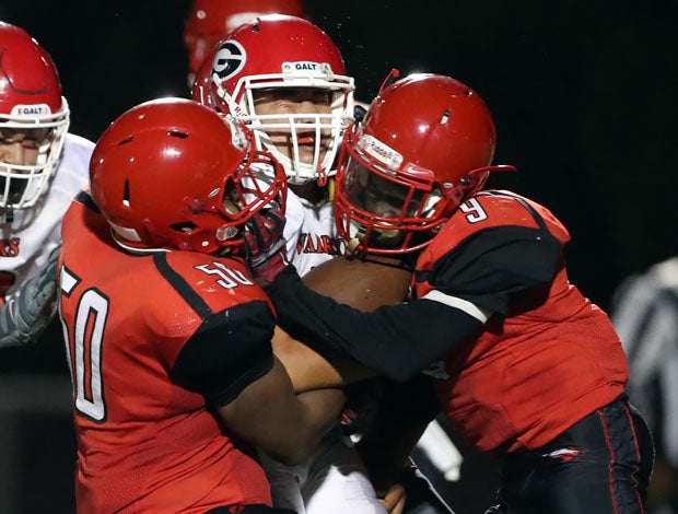 Kennedy crunch — Demetrists Primes (50) and Larry Washington Jr. (9).