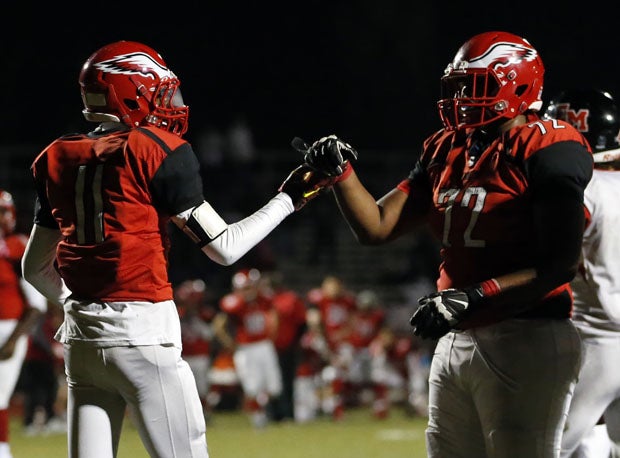 Akeli Nelson (11) and Devon Thomas (72), Kennedy